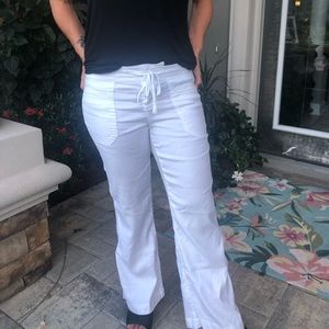 Level 99 white patch pocket, button fly pants.